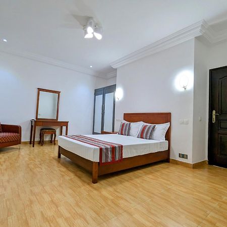 Les Ombrelles Appart'Hotel Котону Экстерьер фото