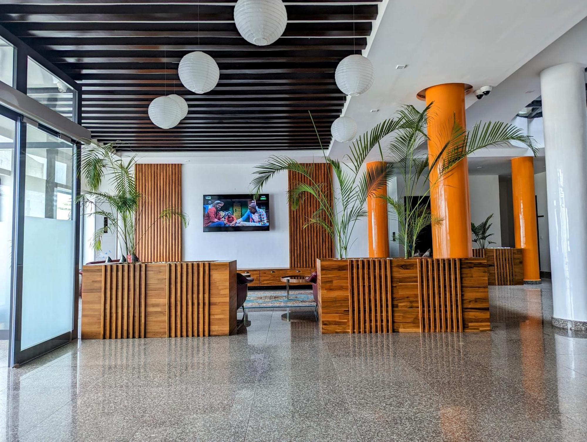 Les Ombrelles Appart'Hotel Котону Экстерьер фото